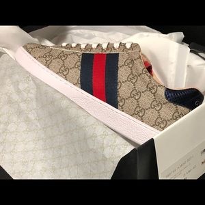 Gucci low top sneakers.